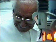 Dr. Labib Barsoum at work with a patient.